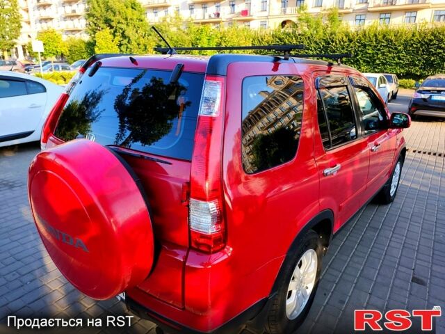 Красный Хонда СРВ, объемом двигателя 2 л и пробегом 225 тыс. км за 7450 $, фото 7 на Automoto.ua