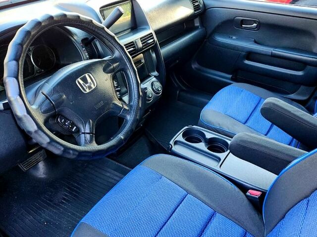 Красный Хонда СРВ, объемом двигателя 2 л и пробегом 225 тыс. км за 7450 $, фото 6 на Automoto.ua