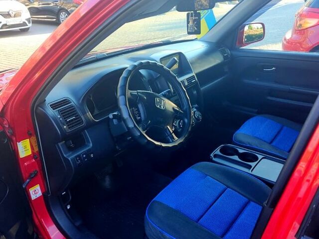Красный Хонда СРВ, объемом двигателя 2 л и пробегом 225 тыс. км за 7450 $, фото 1 на Automoto.ua