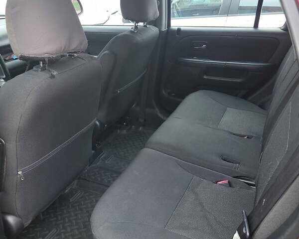 Красный Хонда СРВ, объемом двигателя 2 л и пробегом 257 тыс. км за 6876 $, фото 4 на Automoto.ua