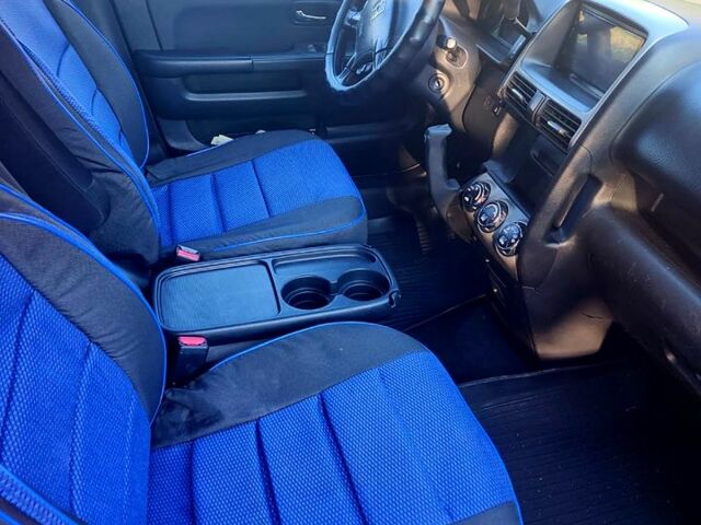 Красный Хонда СРВ, объемом двигателя 2 л и пробегом 225 тыс. км за 7450 $, фото 4 на Automoto.ua