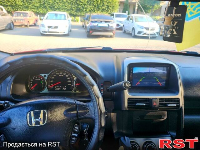 Красный Хонда СРВ, объемом двигателя 2 л и пробегом 225 тыс. км за 7450 $, фото 5 на Automoto.ua