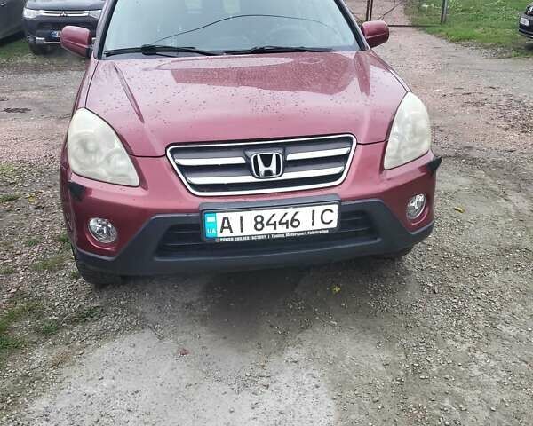 Красный Хонда СРВ, объемом двигателя 2 л и пробегом 257 тыс. км за 6876 $, фото 13 на Automoto.ua