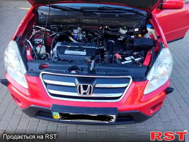 Красный Хонда СРВ, объемом двигателя 2 л и пробегом 225 тыс. км за 7450 $, фото 2 на Automoto.ua