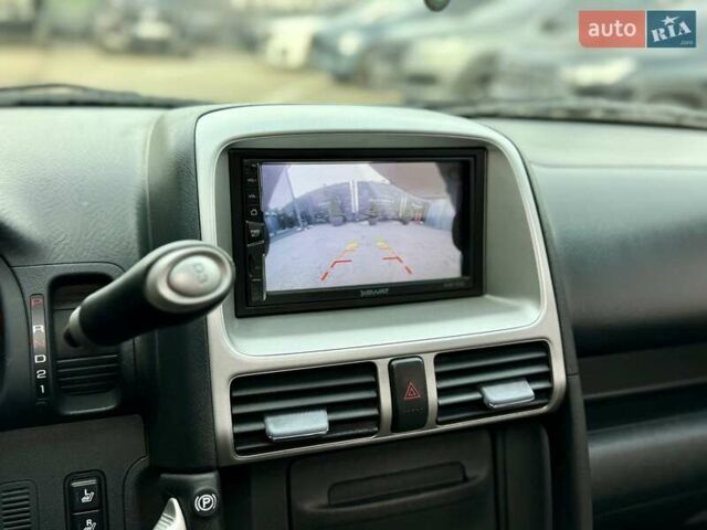 Красный Хонда СРВ, объемом двигателя 2 л и пробегом 321 тыс. км за 7900 $, фото 33 на Automoto.ua