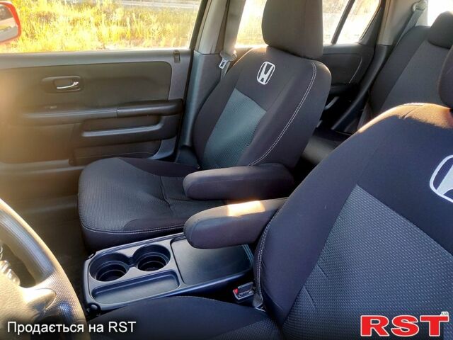 Красный Хонда СРВ, объемом двигателя 2 л и пробегом 216 тыс. км за 8500 $, фото 8 на Automoto.ua