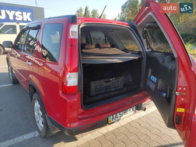 Красный Хонда СРВ, объемом двигателя 2 л и пробегом 216 тыс. км за 8500 $, фото 4 на Automoto.ua