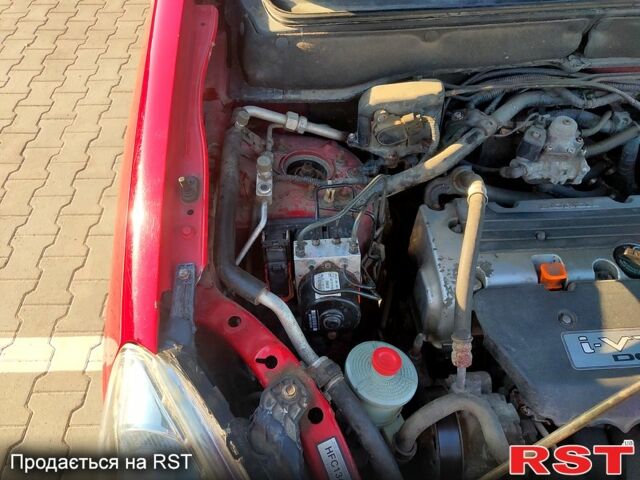 Красный Хонда СРВ, объемом двигателя 2 л и пробегом 216 тыс. км за 8500 $, фото 11 на Automoto.ua