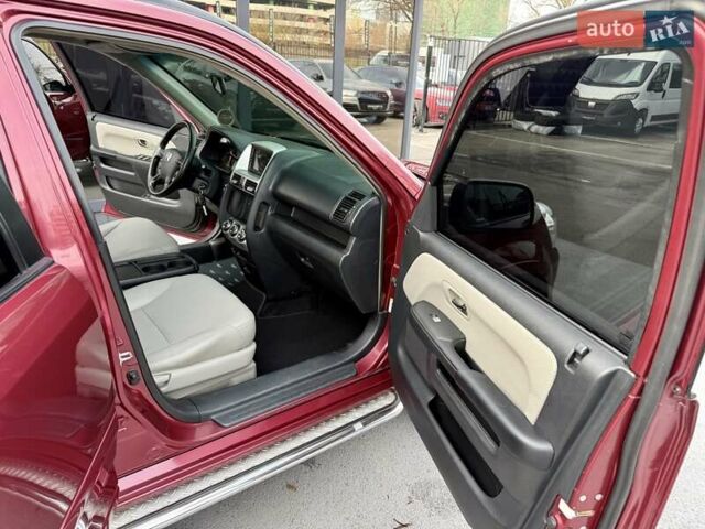 Красный Хонда СРВ, объемом двигателя 2 л и пробегом 321 тыс. км за 7900 $, фото 40 на Automoto.ua