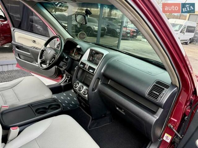 Красный Хонда СРВ, объемом двигателя 2 л и пробегом 321 тыс. км за 7900 $, фото 43 на Automoto.ua