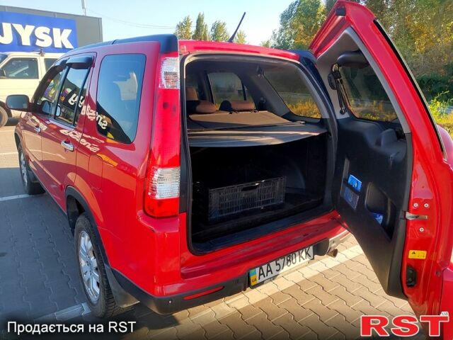 Красный Хонда СРВ, объемом двигателя 2 л и пробегом 216 тыс. км за 8500 $, фото 4 на Automoto.ua