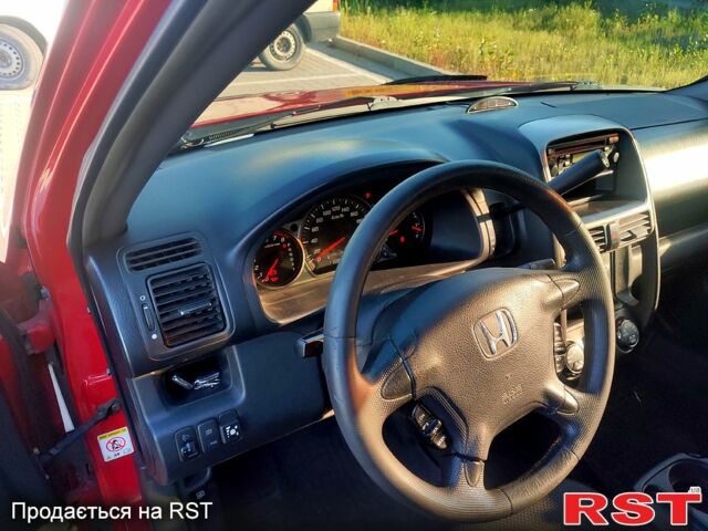 Красный Хонда СРВ, объемом двигателя 2 л и пробегом 216 тыс. км за 8500 $, фото 6 на Automoto.ua