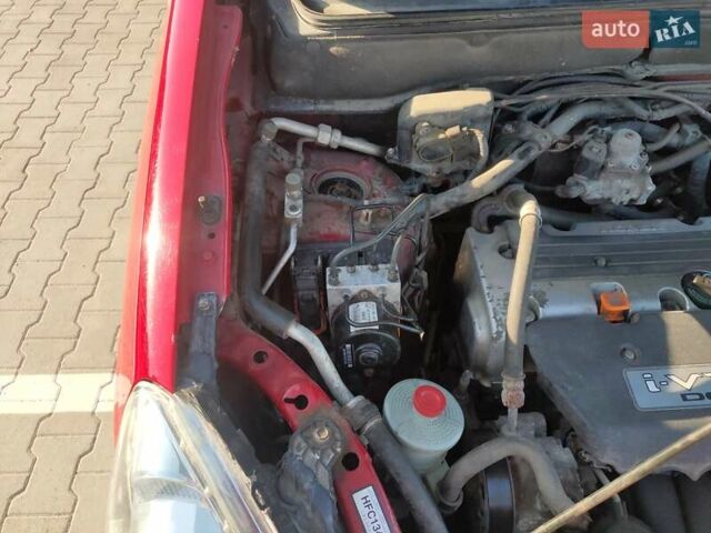 Красный Хонда СРВ, объемом двигателя 2 л и пробегом 216 тыс. км за 8500 $, фото 13 на Automoto.ua