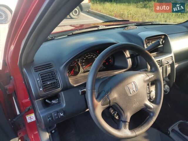 Красный Хонда СРВ, объемом двигателя 2 л и пробегом 216 тыс. км за 8500 $, фото 6 на Automoto.ua