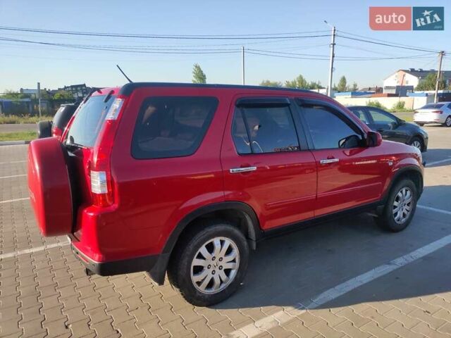Красный Хонда СРВ, объемом двигателя 2 л и пробегом 216 тыс. км за 8500 $, фото 2 на Automoto.ua