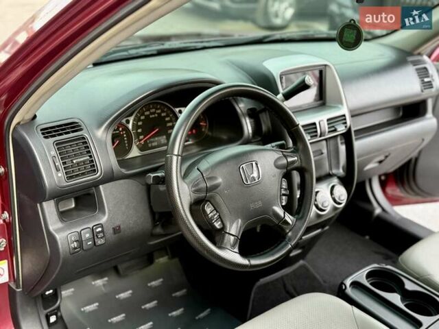 Красный Хонда СРВ, объемом двигателя 2 л и пробегом 321 тыс. км за 7900 $, фото 30 на Automoto.ua