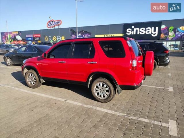 Красный Хонда СРВ, объемом двигателя 2 л и пробегом 216 тыс. км за 8500 $, фото 1 на Automoto.ua
