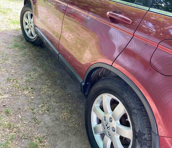 Красный Хонда СРВ, объемом двигателя 2.35 л и пробегом 150 тыс. км за 10000 $, фото 2 на Automoto.ua