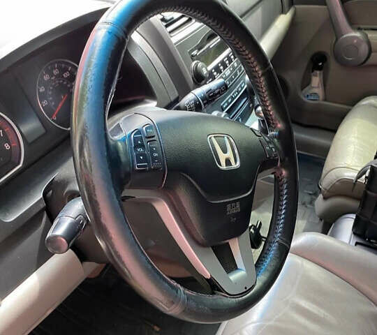 Красный Хонда СРВ, объемом двигателя 2.35 л и пробегом 150 тыс. км за 10000 $, фото 7 на Automoto.ua