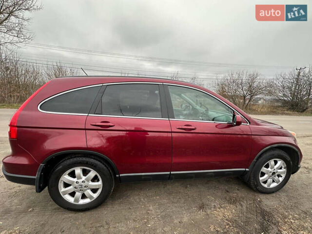 Червоний Хонда СРВ, об'ємом двигуна 2.4 л та пробігом 243 тис. км за 12000 $, фото 2 на Automoto.ua