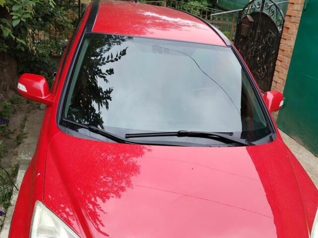 Красный Хонда СРВ, объемом двигателя 2.4 л и пробегом 235 тыс. км за 10500 $, фото 3 на Automoto.ua