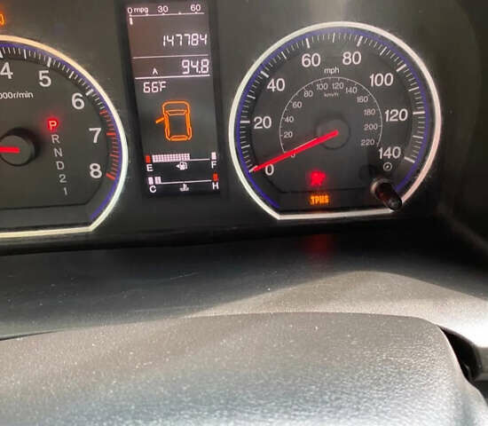 Красный Хонда СРВ, объемом двигателя 2.35 л и пробегом 150 тыс. км за 10000 $, фото 5 на Automoto.ua