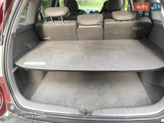 Красный Хонда СРВ, объемом двигателя 2.4 л и пробегом 204 тыс. км за 10000 $, фото 2 на Automoto.ua