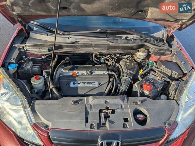 Червоний Хонда СРВ, об'ємом двигуна 2.4 л та пробігом 219 тис. км за 8900 $, фото 31 на Automoto.ua