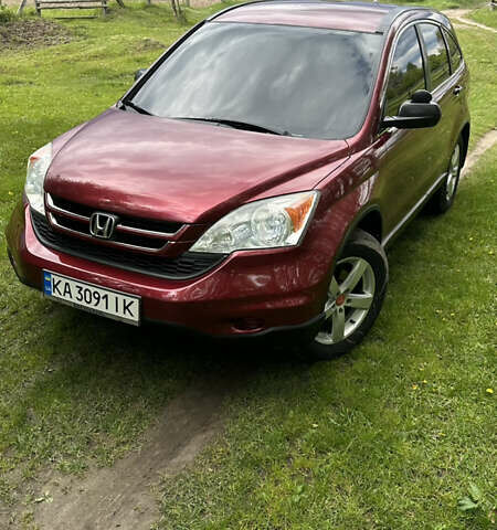 Красный Хонда СРВ, объемом двигателя 2.4 л и пробегом 304 тыс. км за 11500 $, фото 1 на Automoto.ua