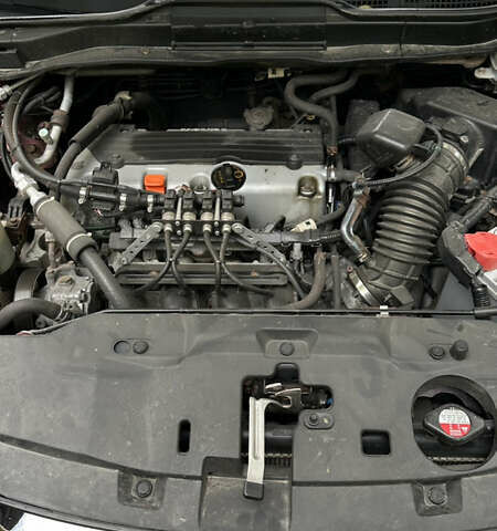 Красный Хонда СРВ, объемом двигателя 2.4 л и пробегом 304 тыс. км за 11500 $, фото 25 на Automoto.ua