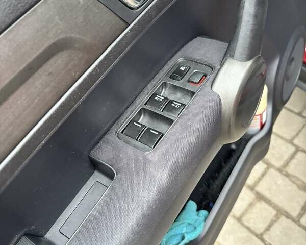 Червоний Хонда СРВ, об'ємом двигуна 2 л та пробігом 220 тис. км за 13200 $, фото 11 на Automoto.ua