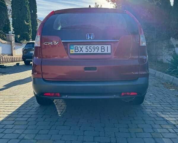 Красный Хонда СРВ, объемом двигателя 2 л и пробегом 153 тыс. км за 14300 $, фото 1 на Automoto.ua