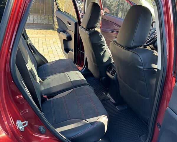 Красный Хонда СРВ, объемом двигателя 2 л и пробегом 153 тыс. км за 14300 $, фото 8 на Automoto.ua