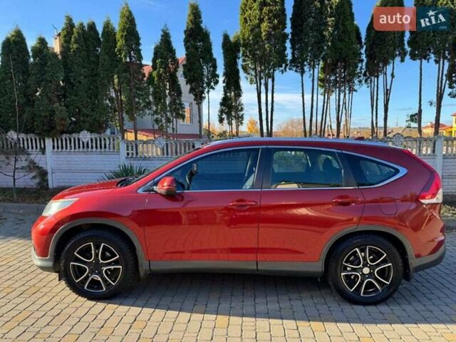 Красный Хонда СРВ, объемом двигателя 2 л и пробегом 153 тыс. км за 14300 $, фото 2 на Automoto.ua