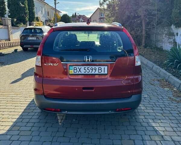 Красный Хонда СРВ, объемом двигателя 2 л и пробегом 153 тыс. км за 14300 $, фото 4 на Automoto.ua