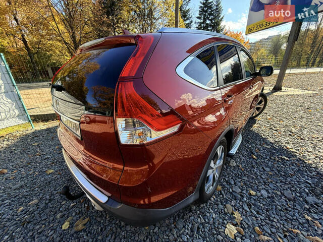 Хонда СРВ 2013 в Трускавце на Automoto.ua Красный Хонда СРВ, объемом двигателя 2.2 л и пробегом 293 тыс. км за 16599 $, фото 17 на Automoto.ua