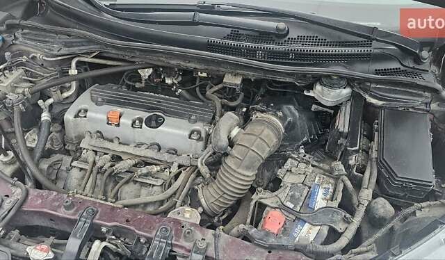 Красный Хонда СРВ, объемом двигателя 2.36 л и пробегом 158 тыс. км за 15600 $, фото 2 на Automoto.ua