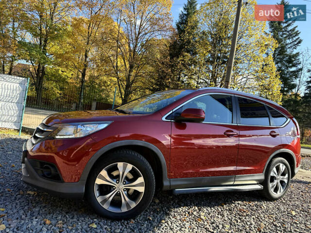 Хонда СРВ 2013 в Трускавце на Automoto.ua Красный Хонда СРВ, объемом двигателя 2.2 л и пробегом 293 тыс. км за 16599 $, фото 10 на Automoto.ua