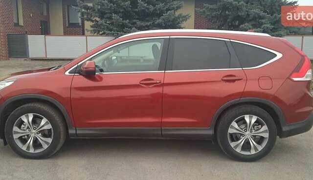 Красный Хонда СРВ, объемом двигателя 2.2 л и пробегом 209 тыс. км за 16950 $, фото 7 на Automoto.ua