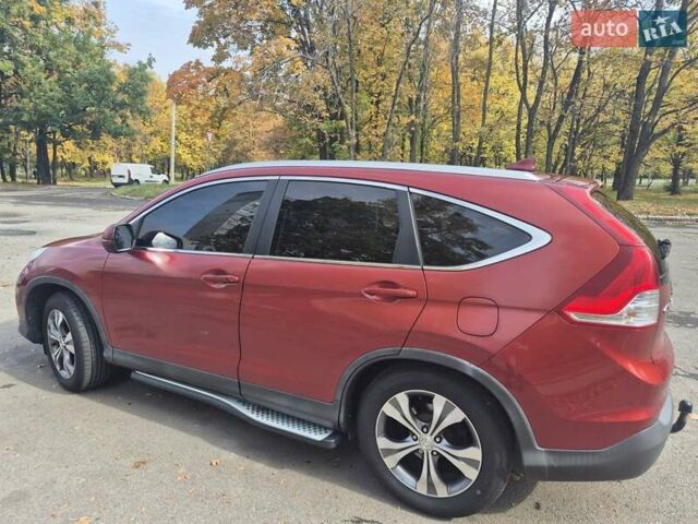 Красный Хонда СРВ, объемом двигателя 2.2 л и пробегом 257 тыс. км за 16900 $, фото 5 на Automoto.ua