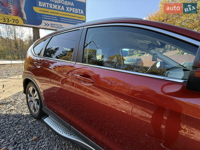 Хонда СРВ 2013 в Трускавце на Automoto.ua Красный Хонда СРВ, объемом двигателя 2.2 л и пробегом 293 тыс. км за 16599 $, фото 6 на Automoto.ua