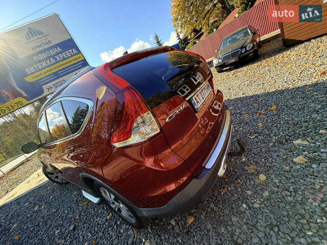 Хонда СРВ 2013 в Трускавце на Automoto.ua Красный Хонда СРВ, объемом двигателя 2.2 л и пробегом 293 тыс. км за 16599 $, фото 24 на Automoto.ua