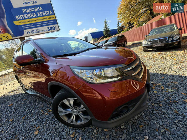 Хонда СРВ 2013 в Трускавце на Automoto.ua Красный Хонда СРВ, объемом двигателя 2.2 л и пробегом 293 тыс. км за 16599 $, фото 4 на Automoto.ua