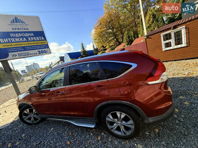 Хонда СРВ 2013 в Трускавце на Automoto.ua Красный Хонда СРВ, объемом двигателя 2.2 л и пробегом 293 тыс. км за 16599 $, фото 75 на Automoto.ua