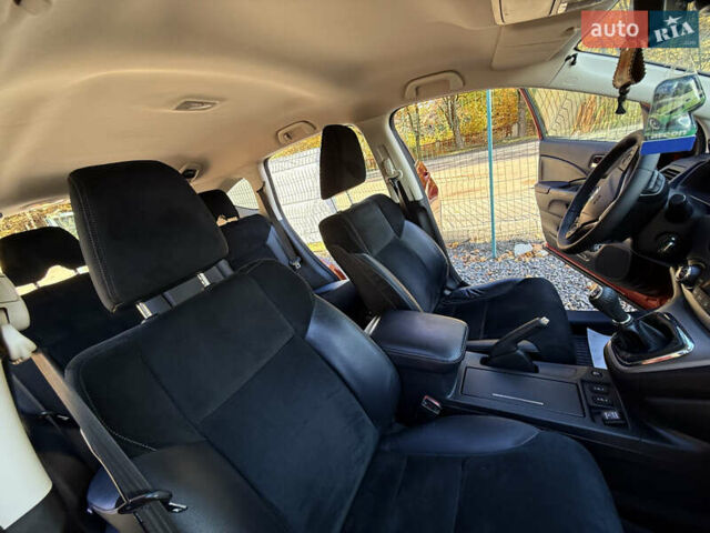 Красный Хонда СРВ, объемом двигателя 2.2 л и пробегом 293 тыс. км за 16599 $, фото 33 на Automoto.ua