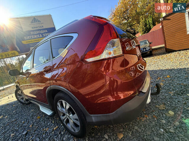 Красный Хонда СРВ, объемом двигателя 2.2 л и пробегом 293 тыс. км за 16599 $, фото 21 на Automoto.ua