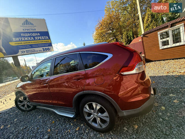 Хонда СРВ 2013 в Трускавце на Automoto.ua Красный Хонда СРВ, объемом двигателя 2.2 л и пробегом 293 тыс. км за 16599 $, фото 23 на Automoto.ua