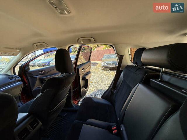 Хонда СРВ 2013 в Трускавце на Automoto.ua Красный Хонда СРВ, объемом двигателя 2.2 л и пробегом 293 тыс. км за 16599 $, фото 49 на Automoto.ua