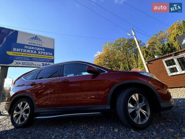 Хонда СРВ 2013 в Трускавце на Automoto.ua Красный Хонда СРВ, объемом двигателя 2.2 л и пробегом 293 тыс. км за 16599 $, фото 61 на Automoto.ua