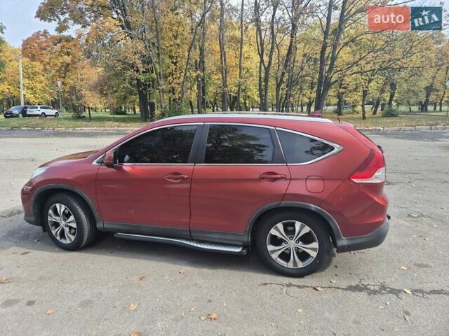 Красный Хонда СРВ, объемом двигателя 2.2 л и пробегом 257 тыс. км за 16900 $, фото 7 на Automoto.ua